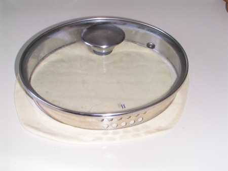 Place lid on dough